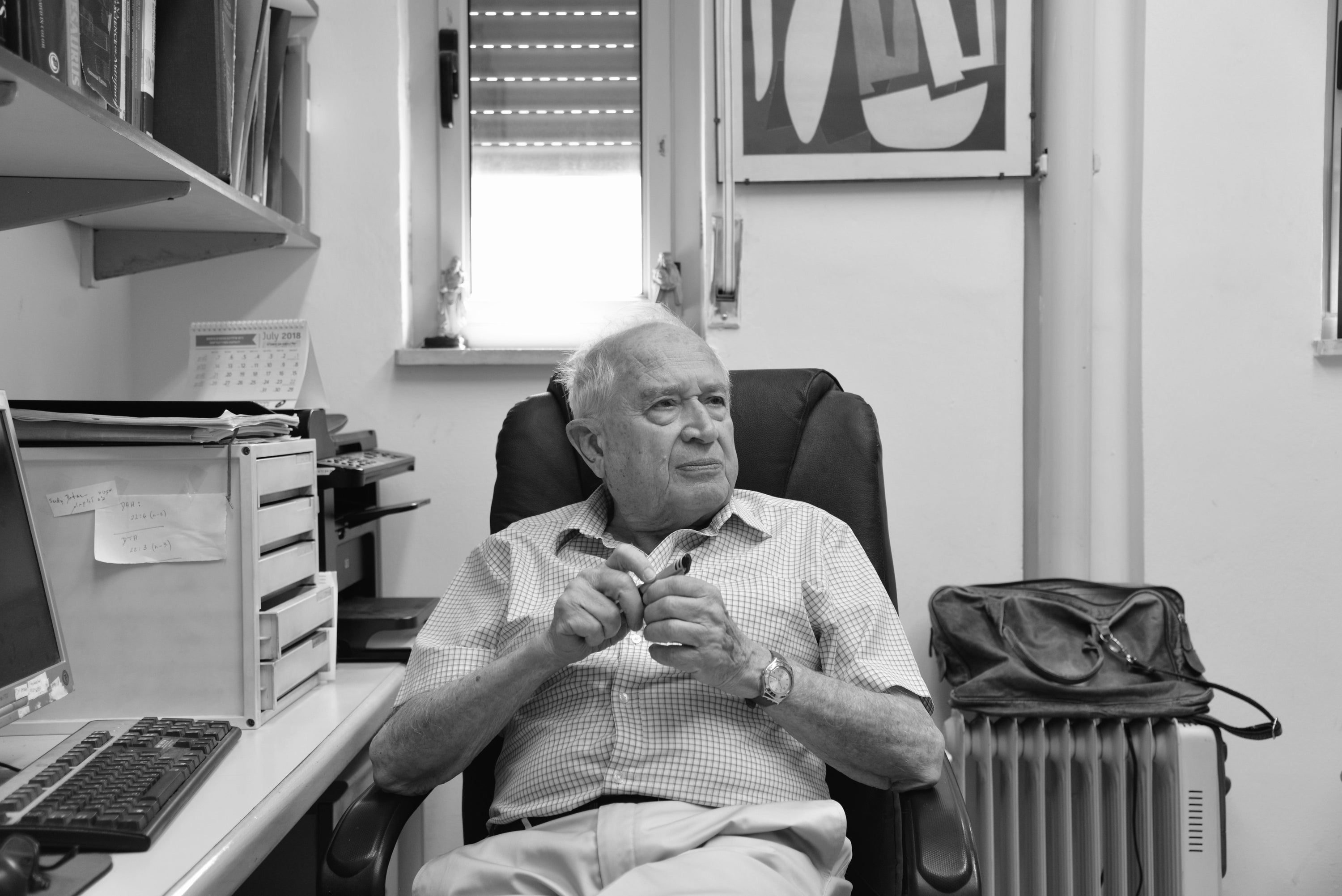 Dr. Mechoulam sitting in his office
